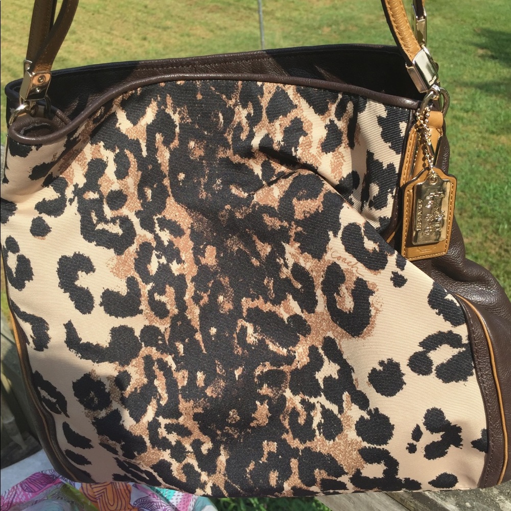 Leopard coach purses never used